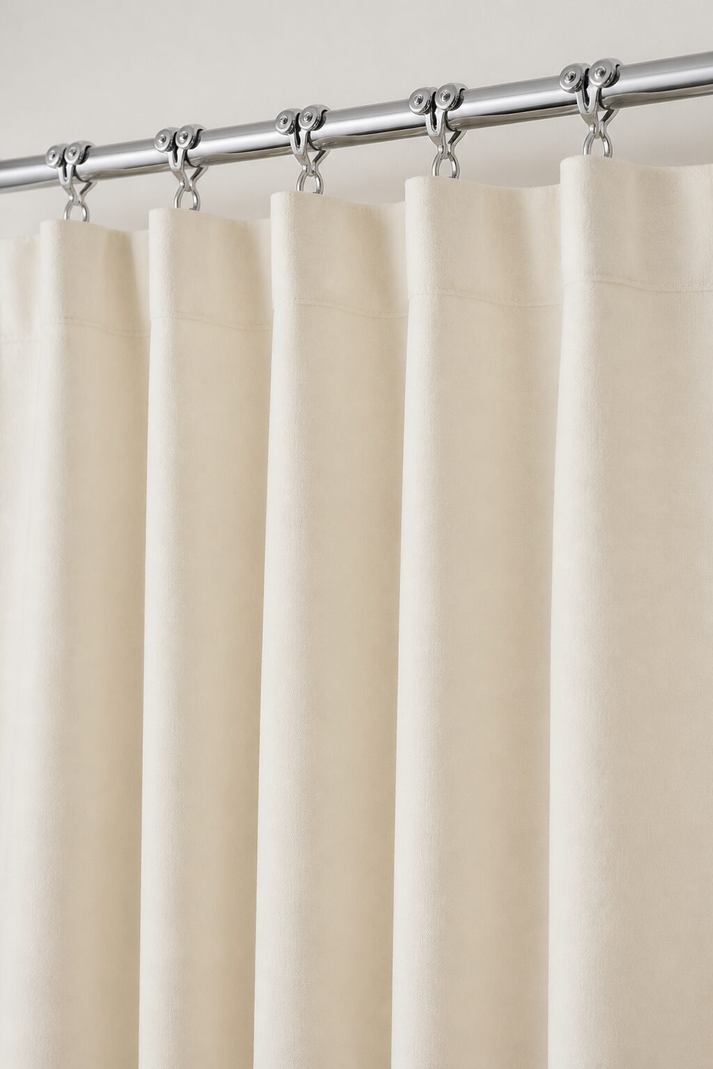 Cream curtain with chrome double roller hooks